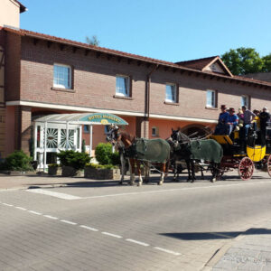 Abreise der Postkutsche